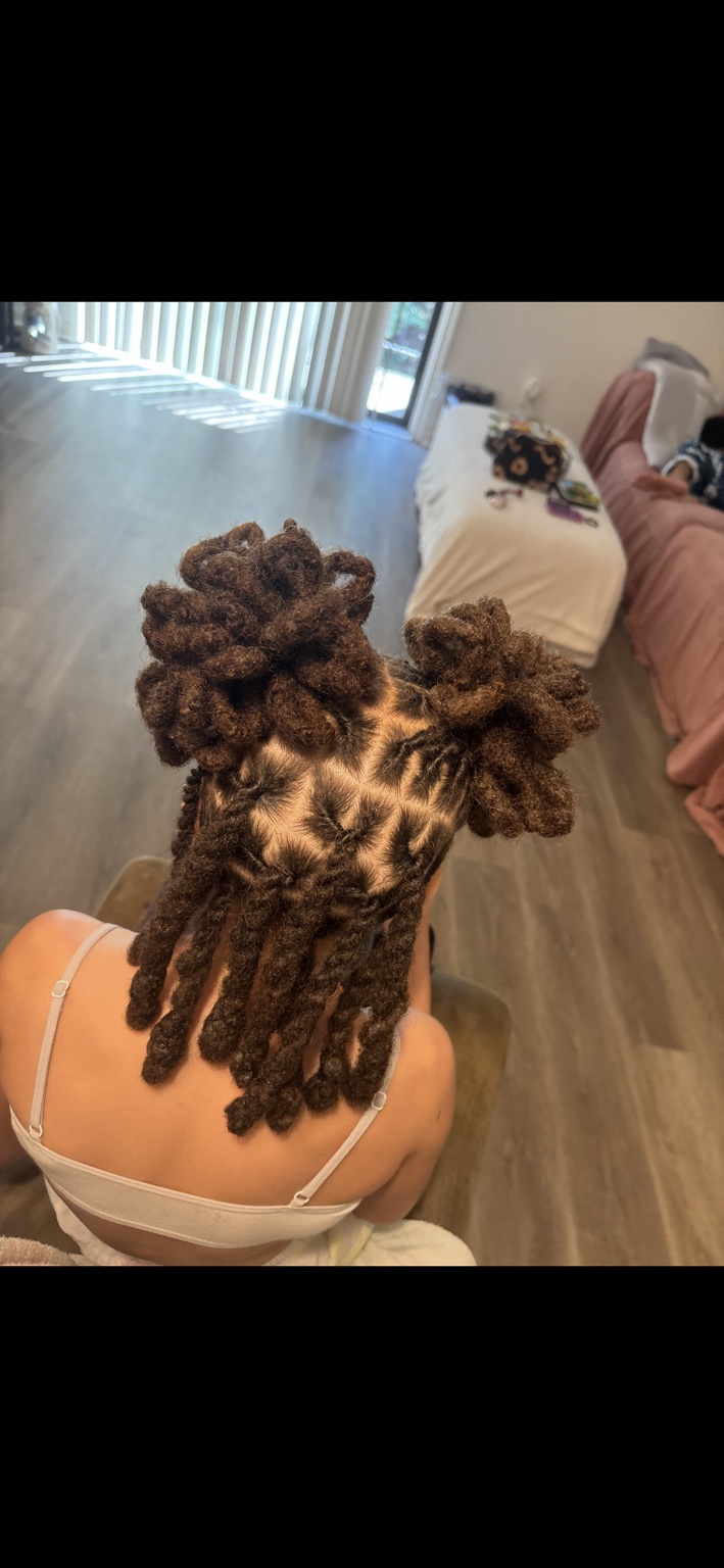 Fresh retwist by LoccGoddess